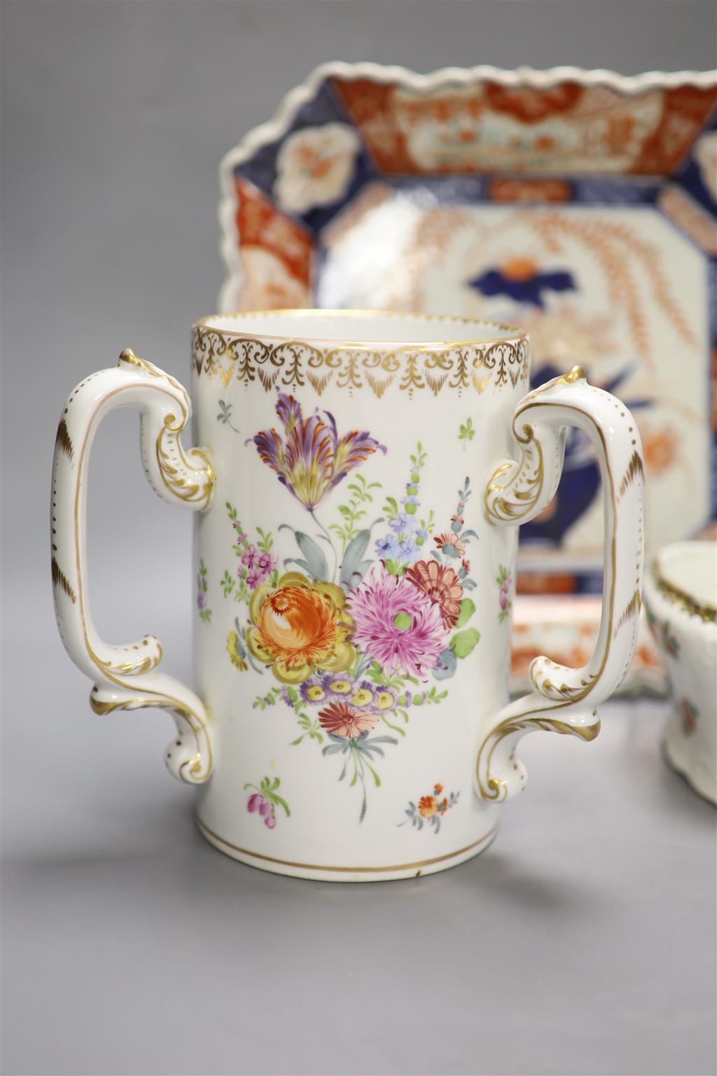 A Dresden porcelain three handled cup, an Imari dish and one other dish